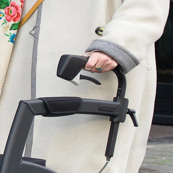 A close up of the handle on a rollz motion walking frame.