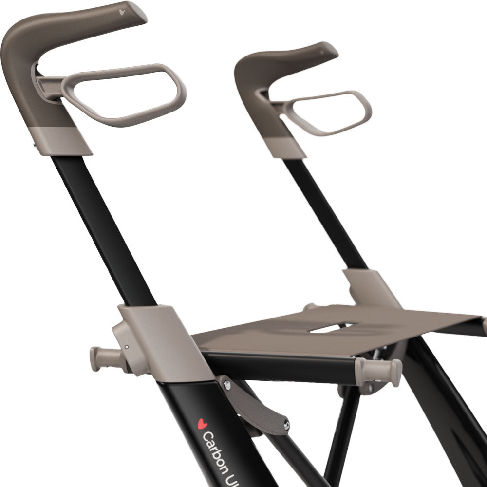 Close up of the handles and seat of a black 'byACRE Carbon Ultralight' rollator.