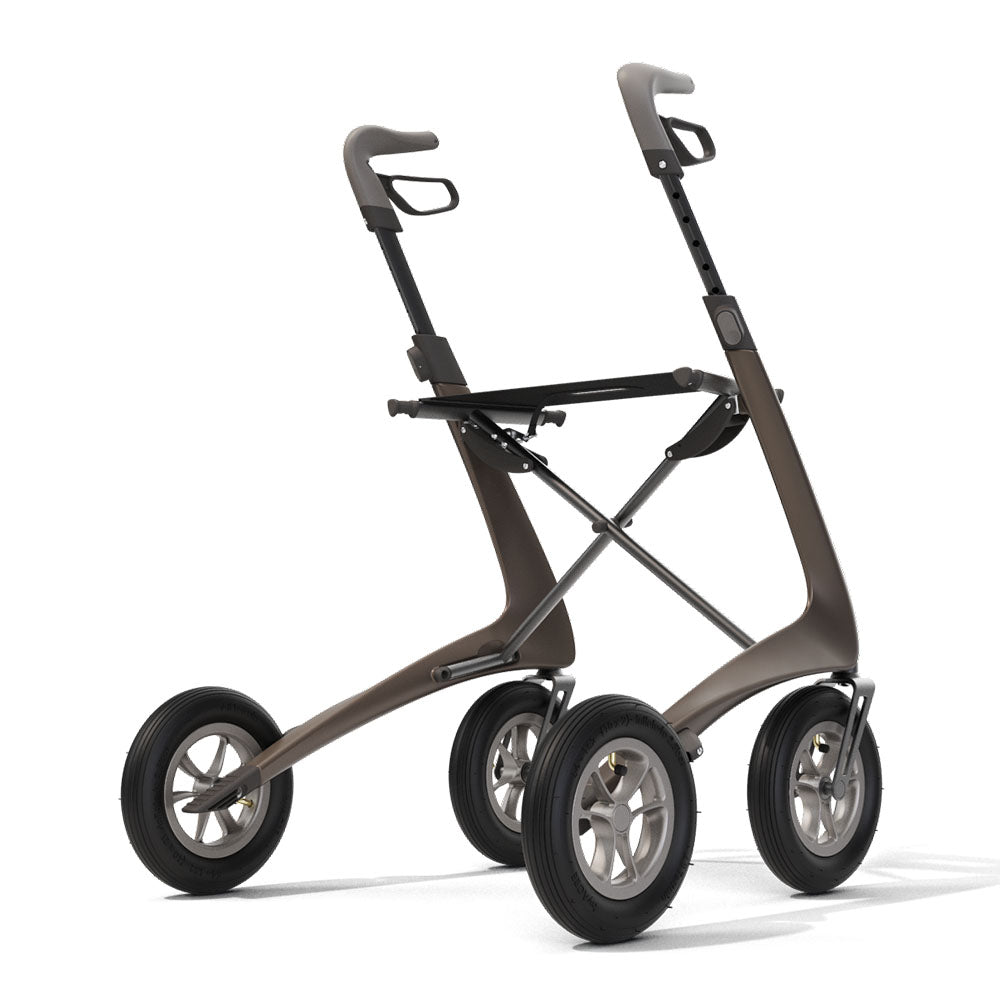 A brown 'byACRE Carbon Overland' rollator, on a white background, rear right side.