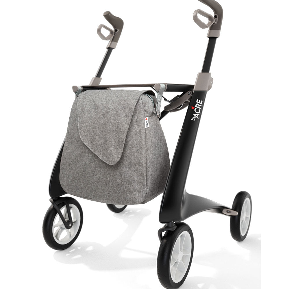 front angle of a byACRE Weekender Bag attached to a black rollator on white background