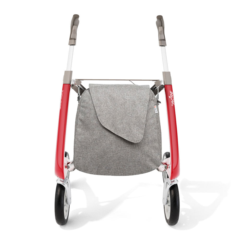 front angle of a byACRE Weekender Bag attached to a red rollator on white background