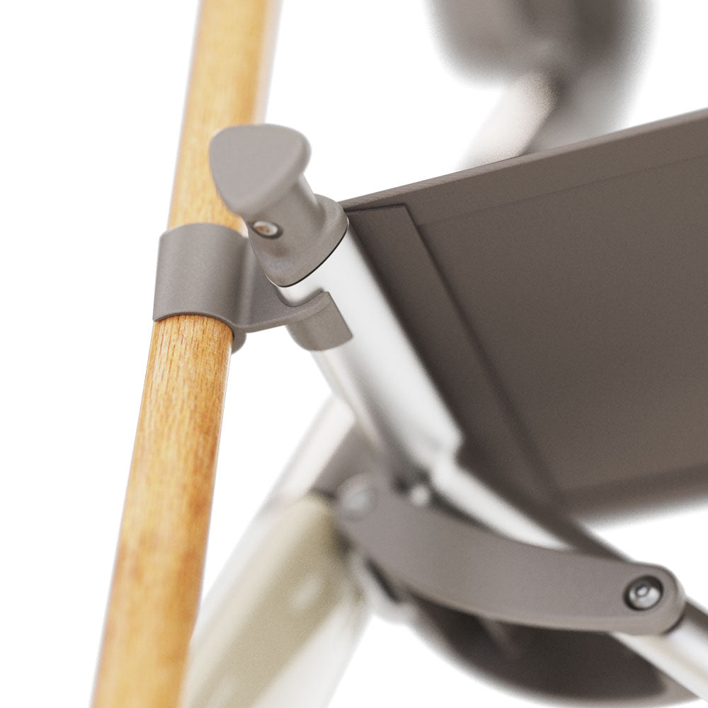 A close up of the cane holder attached to a byACRE ultralight walker